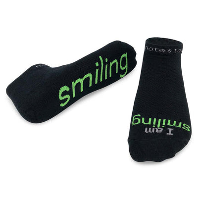 i am smiling black socks with positive message