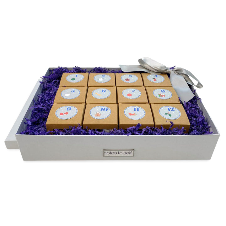 12 little boxes with socks in gift box