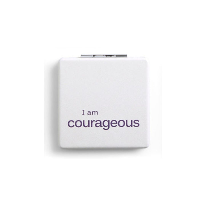 White pocket mirror with 'I am courageous' text