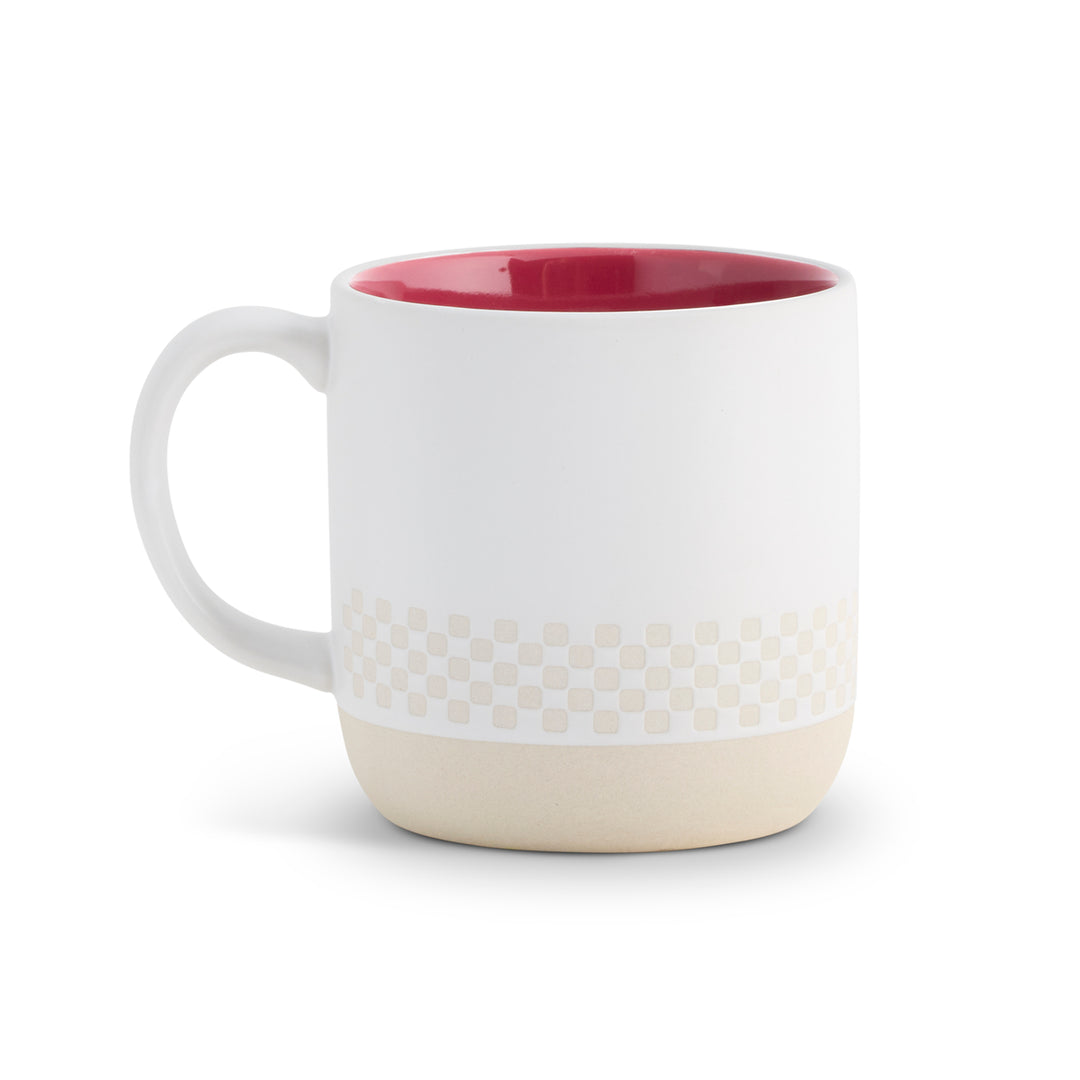 White mug with a dark pink interior on a white background