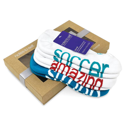 I love playing soccer white socks, I am amazing white socks and I am strong teal socks in a kraft window box