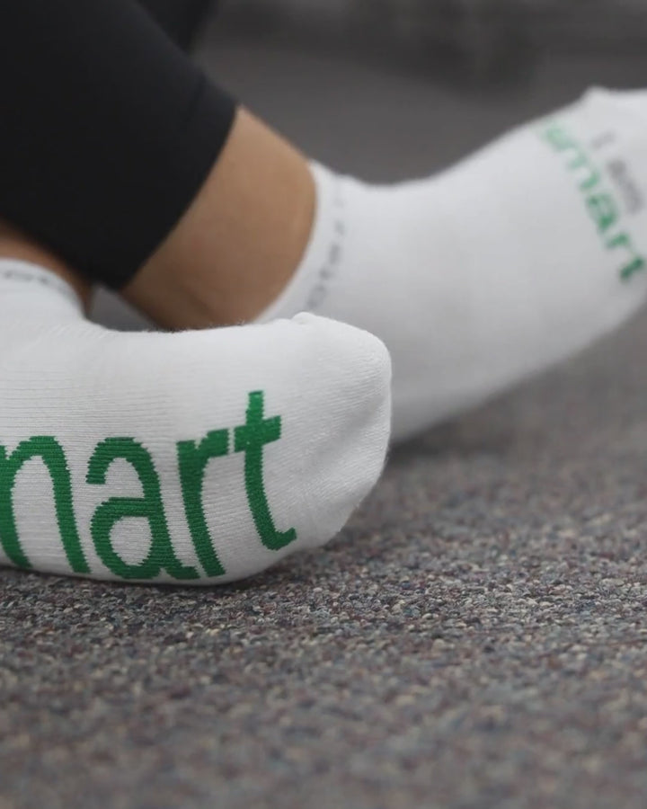 Video of person wearing I am smart socks